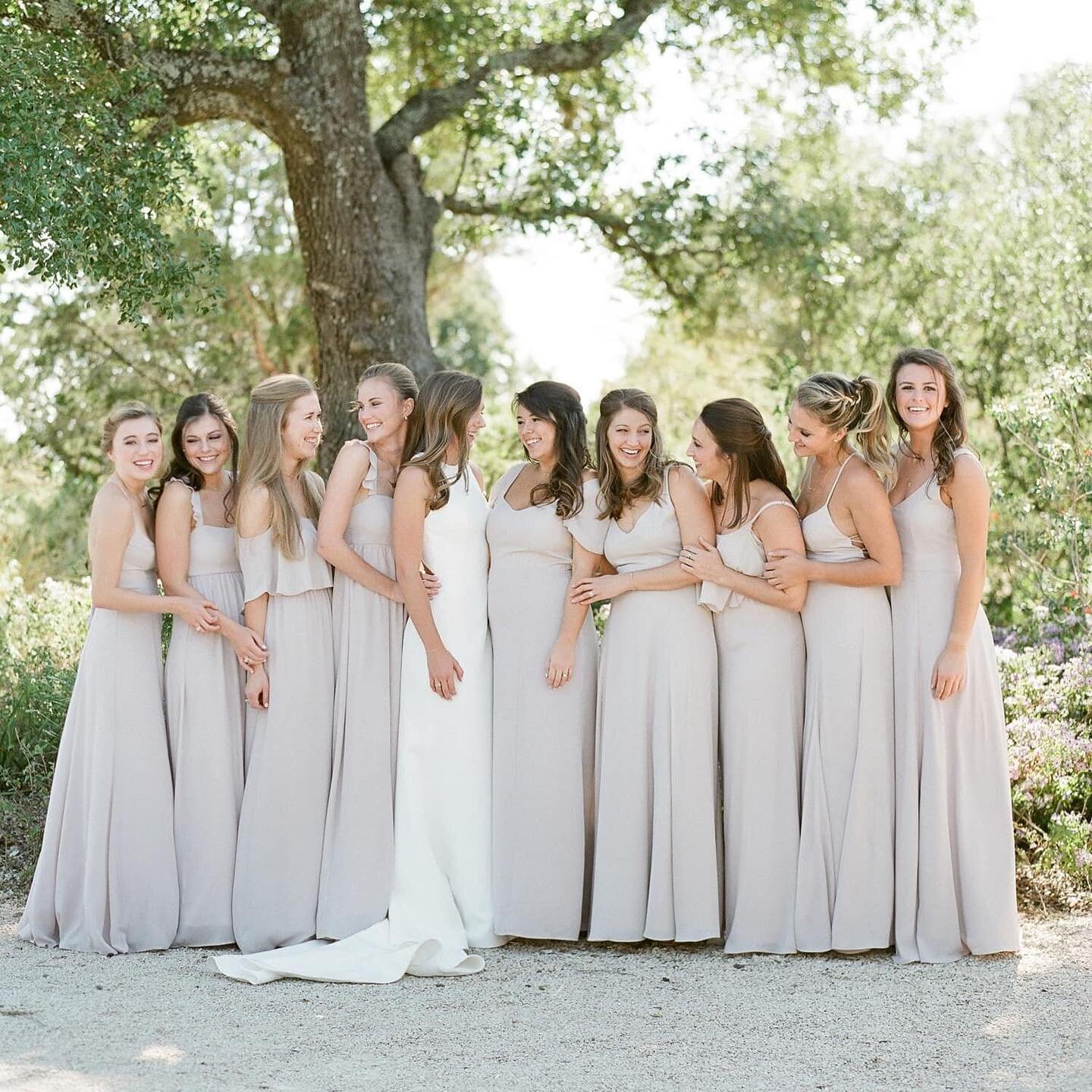 Two sisters and a lot of forever friends. 
I do love a good girls shot without bouquets! Look how everyone looks so cool and casual -  possing in a more relaxed way and holding on to one another. Sometimes with a bouquet in hand you&rsquo;re unable t